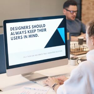 A focused designer works on a user-centric project in a modern office environment.
